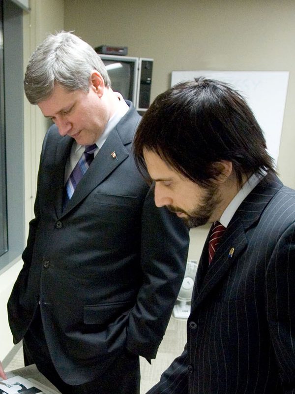 Akiva Prell with Prime Minister Stephen Harper, reviewing campaign materials